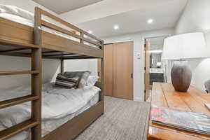 Bedroom featuring recessed lighting, a closet, and connected bathroom