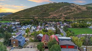 Aerial view at dusk of a residential view and a mountain view