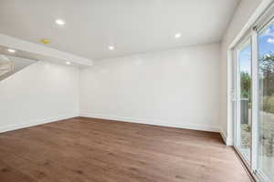 Basement featuring wood finished floors and recessed lighting