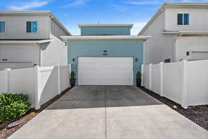 Garage featuring driveway