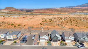 Aerial view of residential area featuring a mountainous background