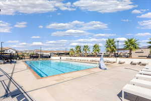 Community pool with a patio area