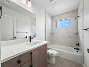 Bathroom featuring bathing tub / shower combination and vanity