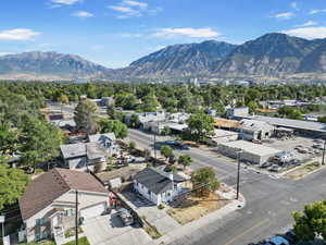 Aerial view of residential area featuring a mountain backdrop
