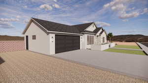 View of side of home with stucco siding, a garage, decorative driveway, stone siding, and a mountain view