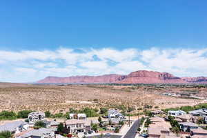 Aerial view of residential area featuring mountains