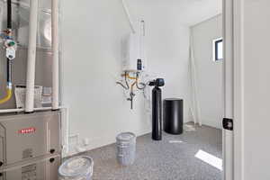 Utility room with heating unit and water heater