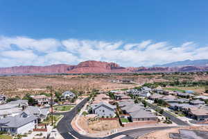Aerial view of residential area with a mountainous background