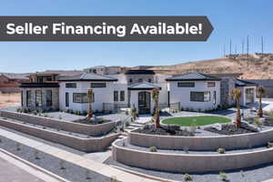Prairie-style house with a gazebo, stucco siding, and a metal roof