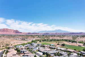 Aerial view of residential area with a mountain backdrop