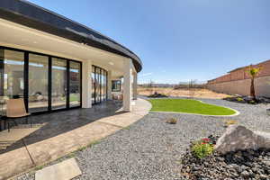 View of yard with a patio area