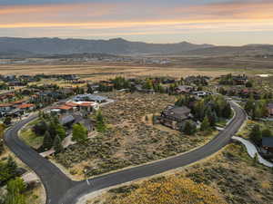 Aerial view at dusk of a residential view and a mountain view