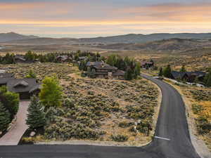 Golden hour light highlights Lot 36’s ideal homesite, framed by Promontory’s open space.
