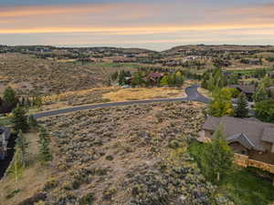 Elevated perspective of The Homesteads with Lot 36 glowing under the soft Park City sunset.