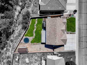 Aerial view of property and surrounding area with property parcel outlined