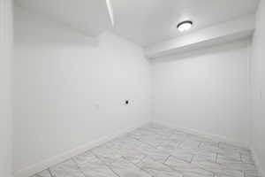 Spare room with baseboards