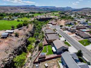 Aerial view of residential area with a mountainous background