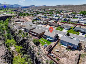 Aerial perspective of suburban area featuring mountains