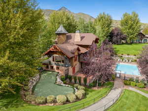 Clubhouse with putting green and pool