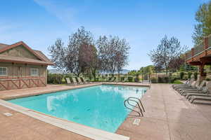 Clubhouse with amenities, out door pool and hot tub, only a stones throw away!