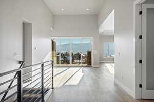 Entry with 14 foot ceilings and mountain views in both directions