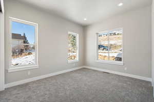 Private extra bedroom on main level with mountain views to the North and to the West