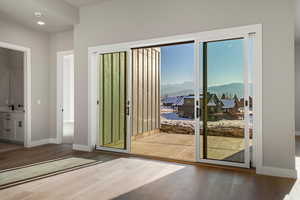 Accordian doors to exterior covered patio with 220 hook up for future hot tub