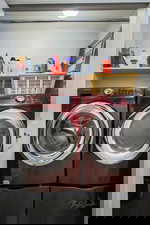 Washroom with separate washer and dryer