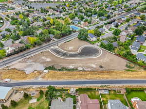 Aerial view of property's location featuring nearby suburban area