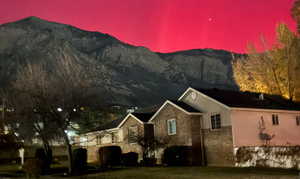 View of home's exterior with a mountain view
