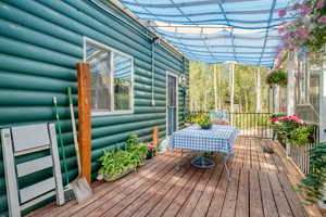 Wooden deck with outdoor dining space