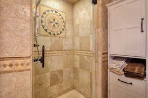 Full bathroom with a stall shower