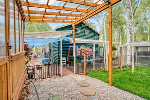 View of patio featuring a wooden deck