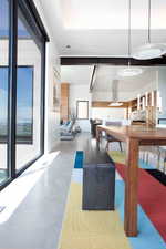 Dining area featuring concrete floors