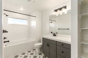 Full bath with washtub / shower combination and vanity