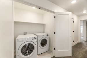 Laundry area featuring independent washer and dryer, carpet, and recessed lighting