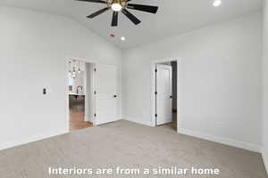 Unfurnished bedroom with light colored carpet, vaulted ceiling, recessed lighting, a ceiling fan, and a chandelier