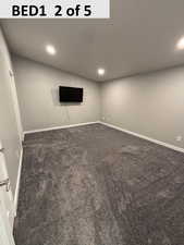 Master featuring carpet flooring and recessed lighting
