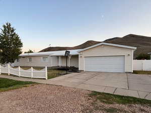 View of front of property featuring driveway