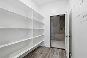 View of pantry leading into big walk in cold storage