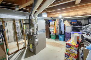 Unfinished basement with heating unit