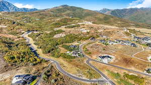 Aerial overview of property's location featuring mountains