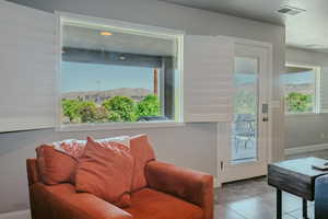 Entryway featuring a mountain view