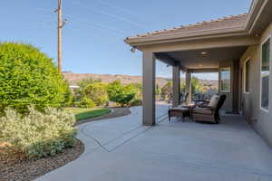 View of patio featuring a mountain view