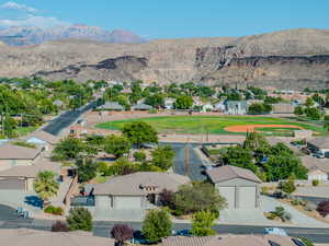 Aerial view of residential area with a mountain backdrop
