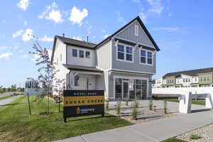 This is the exterior of our model home in Sugar Creek, y are welcome to come by and see this home anytime.  It is the same floorplan as this listing.