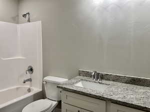 Full bathroom with vanity and  shower combination