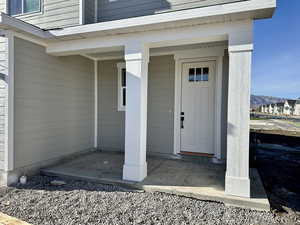 Doorway to property with a porch