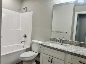 Full bathroom featuring vanity and shower / bath combination