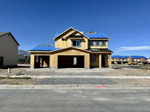 Property in mid-construction featuring a mountain view and a porch